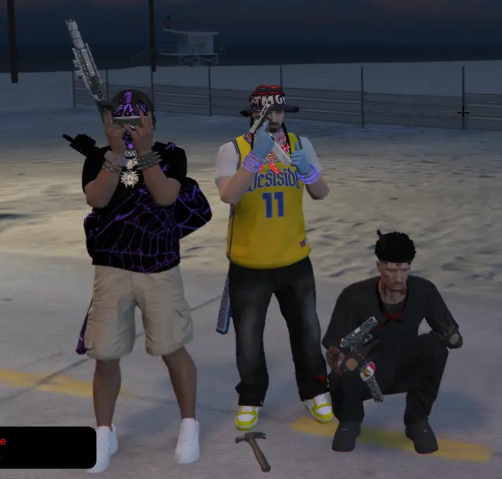 Three LibertyRush citizens posing together near the beach